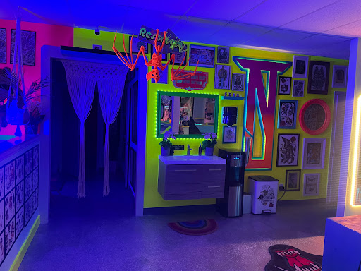 Explore chest arm tattoo ideas, creative tattoo ideas in Houston, available at The Neon Jackal Tattoo