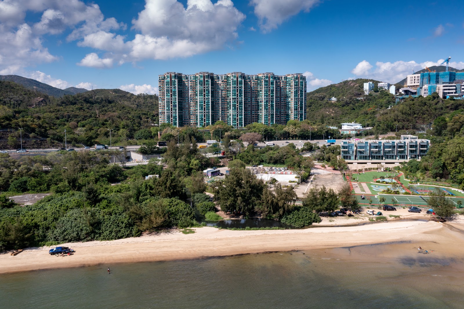 Foto de Xiaolan Beach con arena beige superficie
