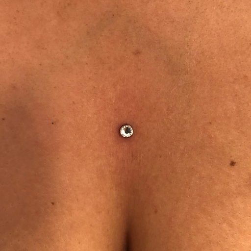 Explore tattoo ideas back of neck, creative tattoo ideas in Palm Harbor, available at Angry Owl Tattoo and Piercing