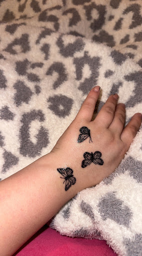 Explore alien tattoo ideas, creative tattoo ideas in Buford, available at Wild Tribe Tattoos and Piercings