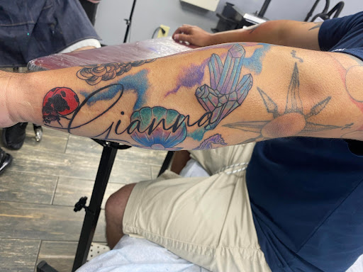 Explore small flowers tattoo ideas, creative tattoo ideas in El Paso, available at American Tattoo Society of Ft Bliss