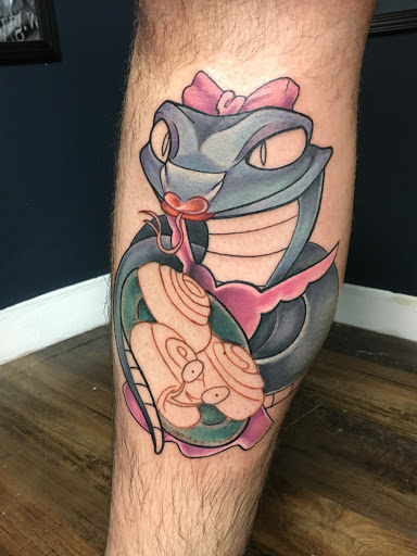 Explore half leg sleeve tattoo ideas for men, creative tattoo ideas in Chapel Hill, available at Golden Falcon Tattoo and Piercing