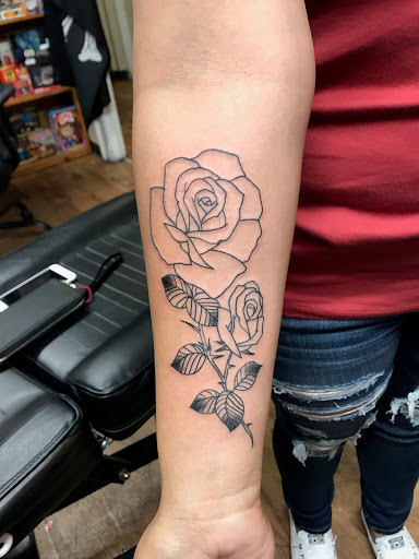 Explore outside arm tattoo ideas, creative tattoo ideas in Russellville, available at Tried and True Tattoo Company