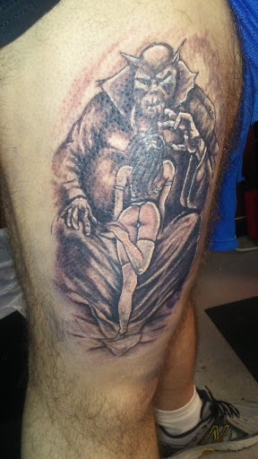 Explore paw tattoo ideas, creative tattoo ideas in Anniston, available at Wicked Game Tattoo & Piercing Studio