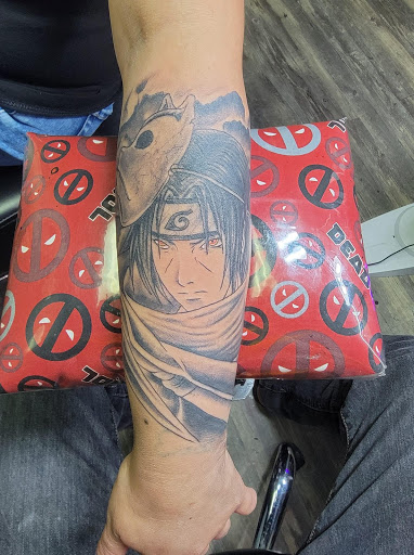 Explore ghostface tattoo ideas, creative tattoo ideas in Athens, available at United Ink Tattoos and Body Piercings