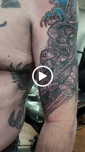 Explore abstract tattoo ideas, creative tattoo ideas in Rogers, available at Saved by Grace Tattoo Studio