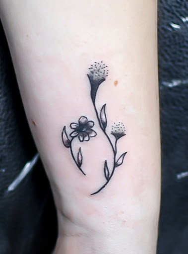 Explore lavender tattoo ideas, creative tattoo ideas in Toledo, available at 4 Nineteen Ink