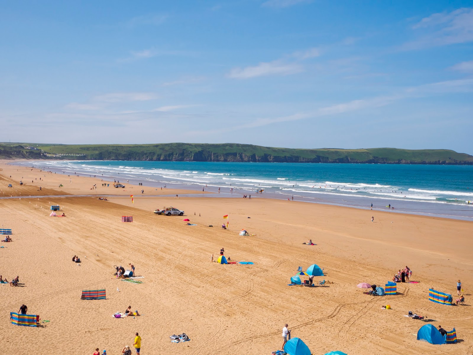 Zdjęcie Plaża Woolacombe z powierzchnią beżowy piasek