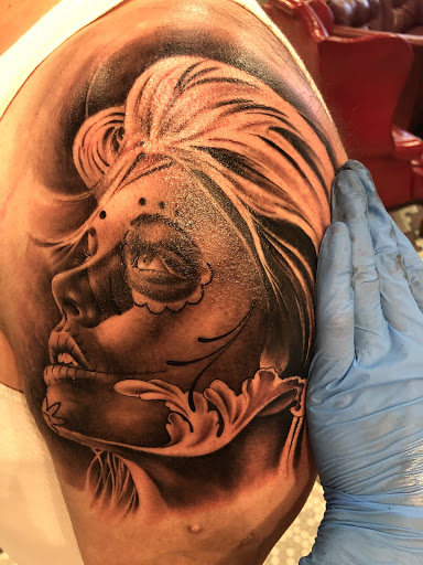 Explore to the moon and back tattoo ideas, creative tattoo ideas in Junction City, available at New Era Tattoo Studio