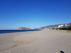 Foto av Tosmur beach med lång rak strand
