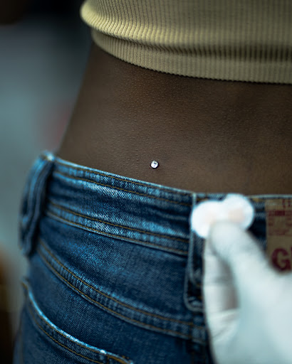 Explore leg tattoo idea for men, creative tattoo ideas in Miami, available at Asere My Piercing