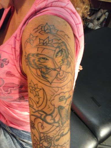 Explore small book tattoo ideas, creative tattoo ideas in Englewood, available at The Original Big Daddy Tattoo & Body Piercing est.1997 est.1997