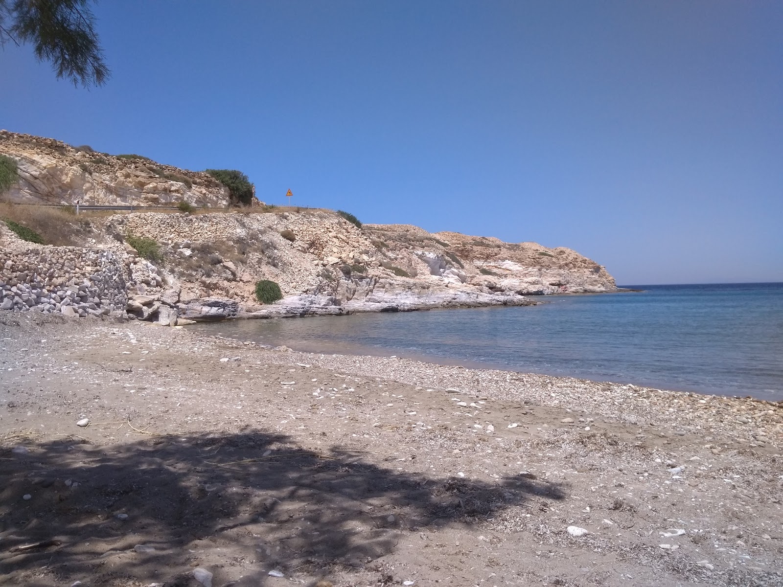 Photo of Klima beach with turquoise pure water surface