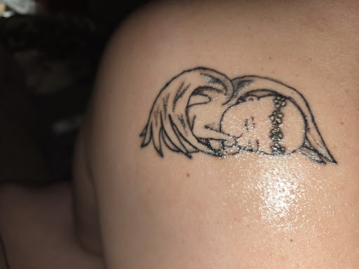 Explore tattoo ideas for son on dad, creative tattoo ideas in Owosso, available at Twisted ink tattoo