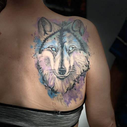 Explore spartan helmet tattoo ideas, creative tattoo ideas in Evansville, available at Ink Therapy 101