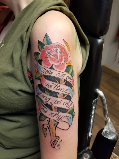 Explore side tattoo ideas for females, creative tattoo ideas in Cumberland, available at Queen City Ink