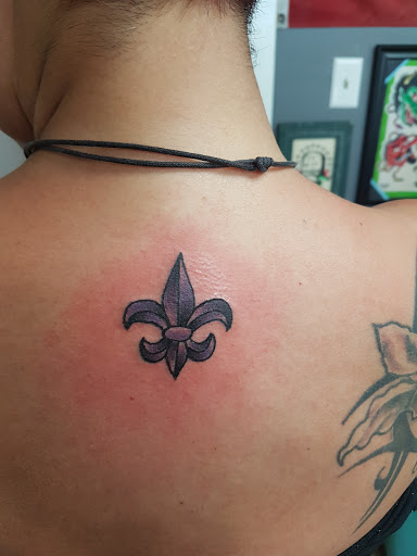 Explore dandelion tattoo ideas, creative tattoo ideas in Baton Rouge, available at Black Torch Tattoo