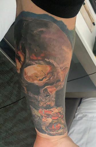 Explore trapezius tattoo ideas, creative tattoo ideas in Fort Wayne, available at FullBloom Tattoos