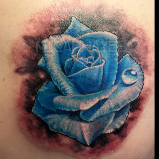 Explore phantom of the opera tattoo ideas, creative tattoo ideas in Cheyenne, available at The T.R.I.B.E. Zoo, LLC Tattoo