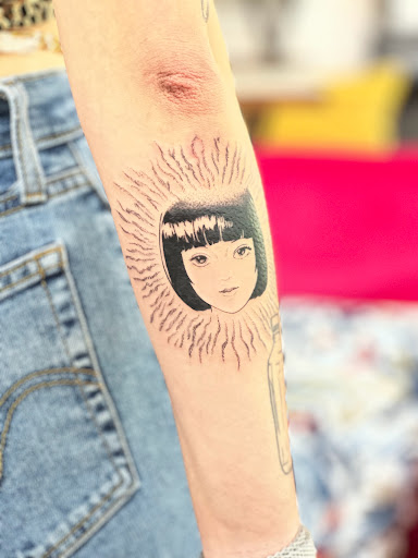 Explore korn tattoo ideas, creative tattoo ideas in Charlotte, available at Gilded Unicorn Tattoo Parlor