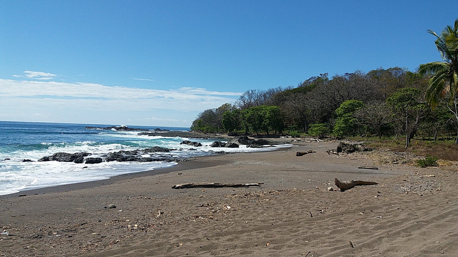 Photo of Quizales Beach with spacious bay
