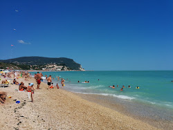 Photo de Marcelli Beach protégé par des falaises