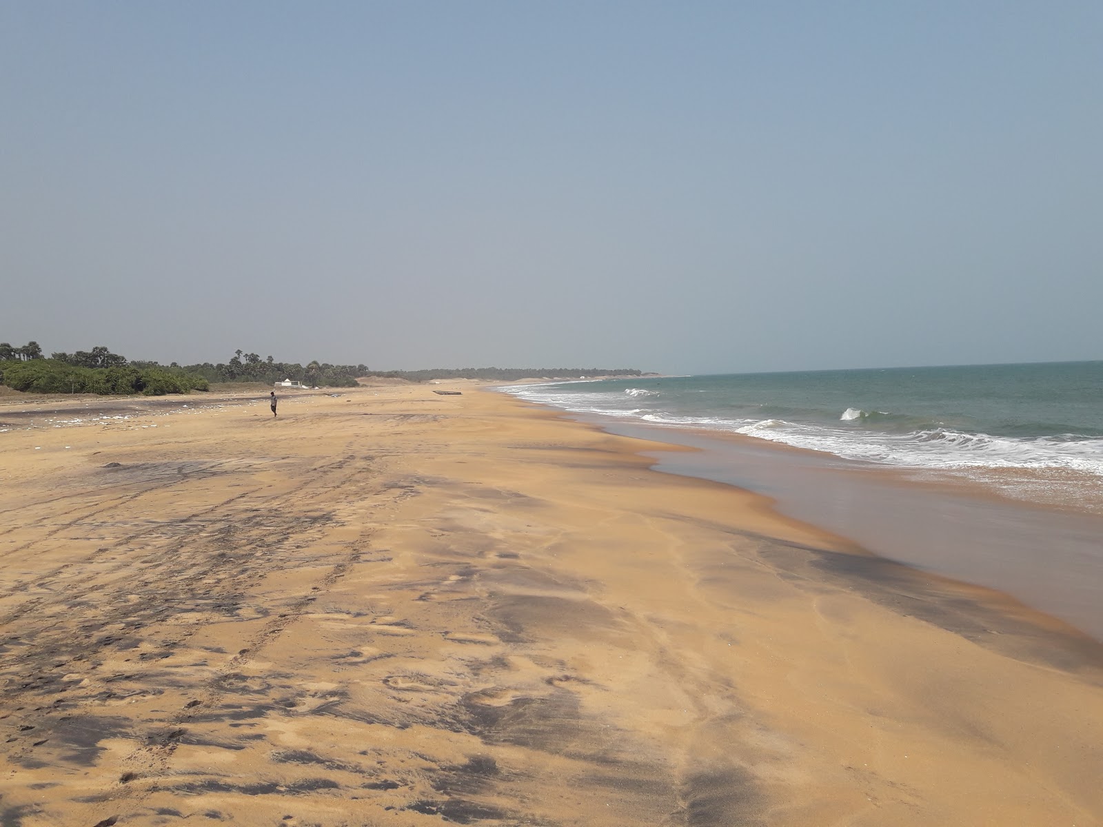 Φωτογραφία του Kancheru Beach με φωτεινή άμμος επιφάνεια