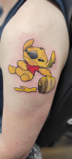 Explore snake sleeve tattoo ideas, creative tattoo ideas in Ocala, available at Black Lotus Tattoo & Art Gallery Inc