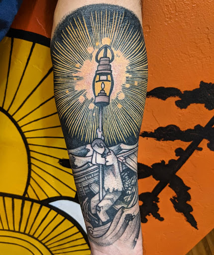 Explore black mens tattoo ideas, creative tattoo ideas in Green Bay, available at Endless Expansion Custom Tattoo LLC & Alyssa Marie Paramedical & Areola Tattoos