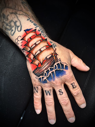 Explore lung cancer ribbon tattoo ideas, creative tattoo ideas in Adrian, available at Ambition Ink