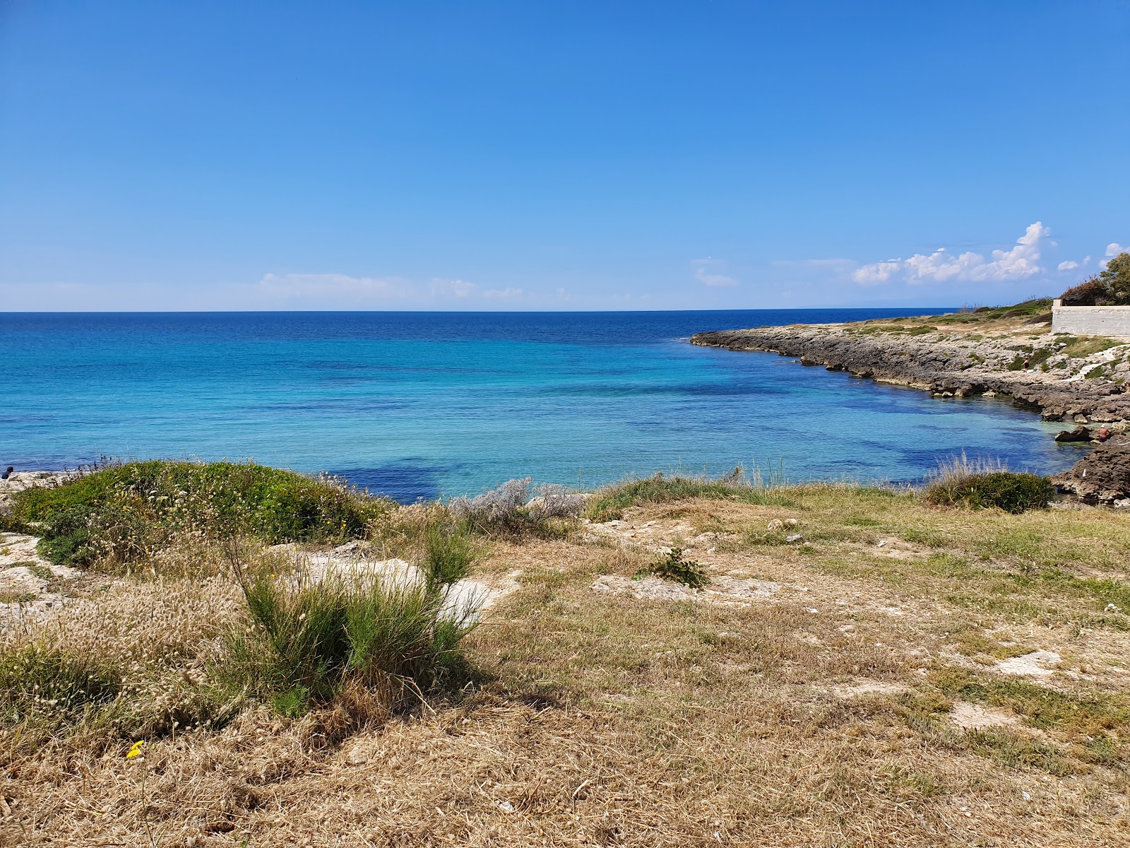 Fotografija Spiaggia di Porto Franco z majhen zaliv