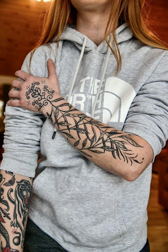 Explore name tattoo ideas for females, creative tattoo ideas in Ironwood, available at Iron Ink Tattoos