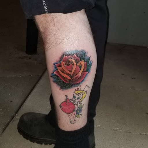 Explore red ink neck tattoo ideas, creative tattoo ideas in Lubbock, available at Sinners & Saints Art Company