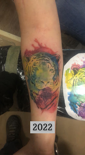 Explore mens throat tattoo ideas, creative tattoo ideas in Sunbury, available at Spot of Ink