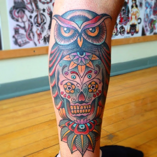 Explore knee cap tattoo ideas for men, creative tattoo ideas in Milwaukee, available at Solid State Tattoo