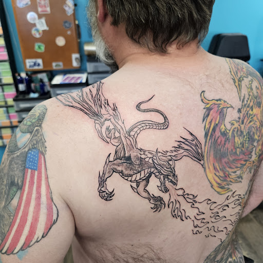 Explore bear sleeve tattoo ideas, creative tattoo ideas in Traverse City, available at Pinups & Needles