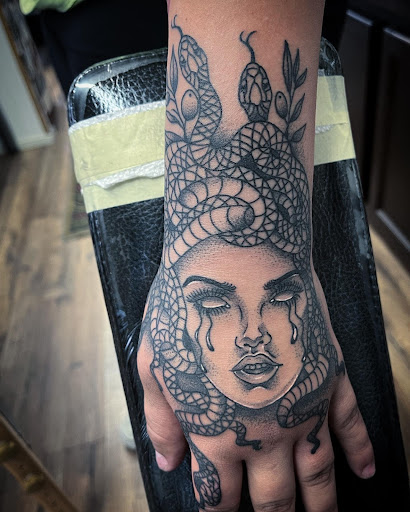 Explore spider tattoo ideas, creative tattoo ideas in Madera, available at Sea Wolf Tattoo