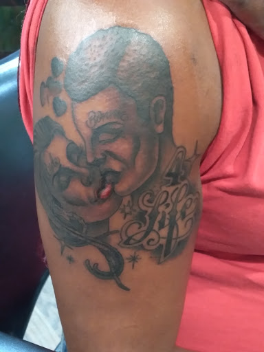 Tattoo Shop «Landmark Tattoo», reviews and photos, 609 E 13th Ave, Denver, CO 80203, USA