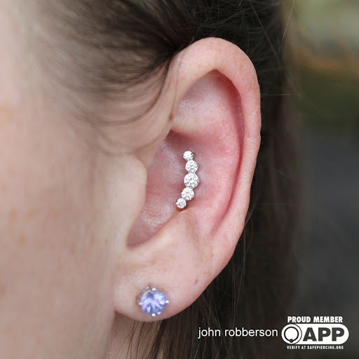 Explore in god we trust tattoo ideas, creative tattoo ideas in Fort Myers, available at Tiger Lotus Tattoo and Piercing