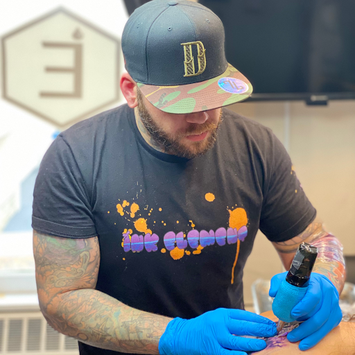 Explore softball tattoo ideas, creative tattoo ideas in Tiffin, available at Ink Element Tattoo Studio