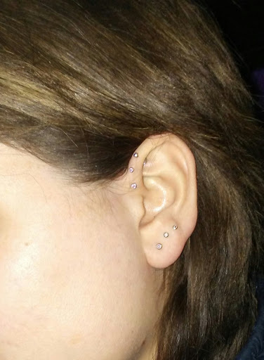 Explore rapper tattoos ideas, creative tattoo ideas in Denver, available at Sacred Soul Tattoo