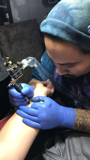 Explore neck tattoo ideas men, creative tattoo ideas in Winston Salem, available at Inktellectuals Art Gallery