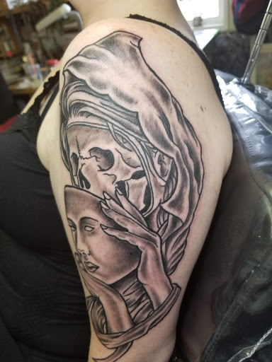 Explore skull and rose tattoo ideas, creative tattoo ideas in Wenatchee, available at Rebels Tattoo Studio