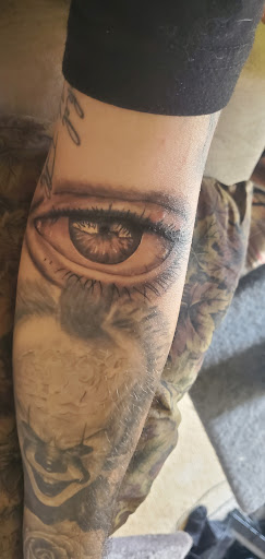 Explore joker card tattoo ideas, creative tattoo ideas in Sweetwater, available at Pinnacle Tattoo Studio