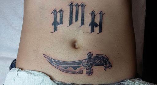 Explore tattoos behind ear ideas, creative tattoo ideas in Chattanooga, available at Painted Lady Tattoo Parlor