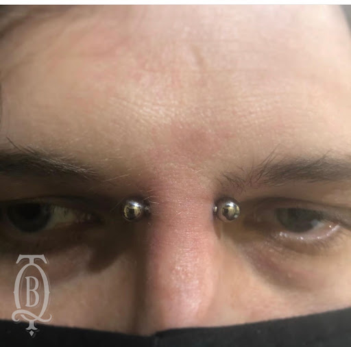 Explore tattoo position ideas, creative tattoo ideas in Marietta, available at The Queen Bee Tattoo and Piercing Parlour