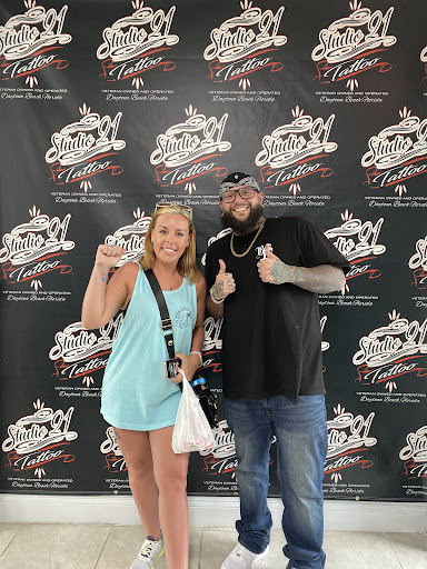 Explore hood neck tattoos ideas, creative tattoo ideas in Daytona Beach, available at Studio 21 Tattoo & Piercings Daytona Beach