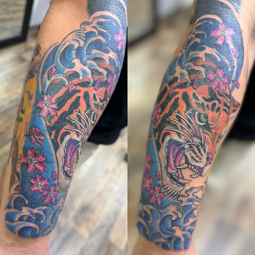 Explore foo fighters tattoo ideas, creative tattoo ideas in Vincennes, available at Silver Owl Tattoo