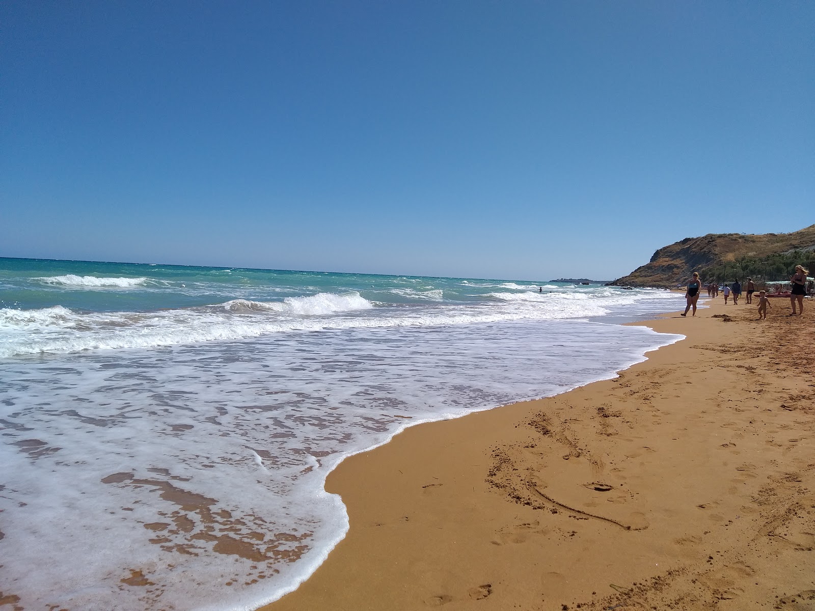 Foto de Villaggio Casarossa com praia espaçosa