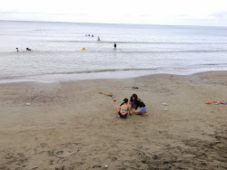 Linaon Beach'in fotoğrafı geniş bir kıyı şeridi ile birlikte
